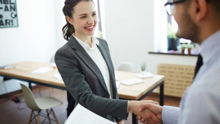 employer and employee shaking hands in mauritius